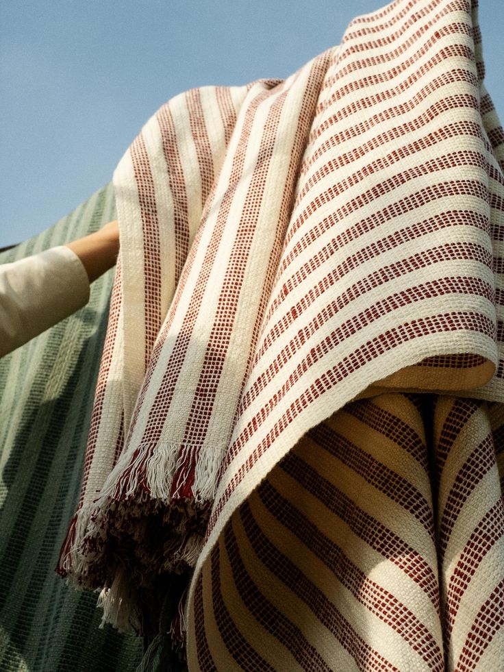 Soft woven textiles styled in a calm home setting